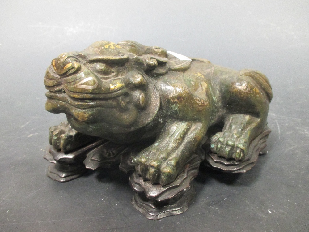 An inlayed bronze representing a Mythical beast