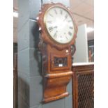 A late Victorian walnut and inlaid drop dial wall clock with continental movement approx 82cm