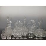 A collection of glassware to include a pair of decanters, two large goblets etc