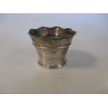 A small silver bowl by Sibray, Hall & Co Ltd, London 1911, of tapered cylindrical form below a