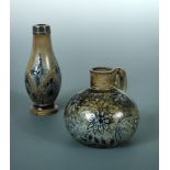 A Martin Brothers stoneware jug and a specimen vase, the jug with blue flowerheads and loop