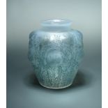 Domremy, an R. Lalique glass vase, with blue highlights, etched R. Lalique marks and numbered 979