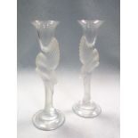 Igor Carl Fabergé, a pair of clear and frosted glass Snow Dove pattern candlesticks, each with