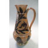 Arthur Barlow for Doulton Lambeth, a stoneware jug, with incised foliate decoration, impressed and