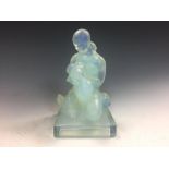 A Sabino opalescent glass model of a young woman, kneeling with doves, etched mark 16cm (6in) A