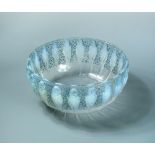 Perruches, an R. Lalique opalescent glass bowl, with blue highlighting, stencilled R. Lalique mark