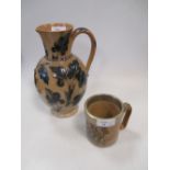 Hannah Barlow for Doulton Lambeth, a small stoneware mug, together with a Frank Butler jug (2) A