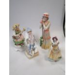 A collection of about 20 bone china or porcelain figurines, including Royal Worcester and Goebel,