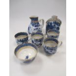 A late 18th century Chinese blue and white part set to include: a jug, a caddy, four coffee cups and