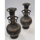 A pair of Japanese bronze vases, 29cm high