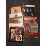 Six Beatles LP records, and few other 33rpm records