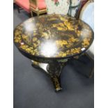 A pair of black japanned and decoupage decorated circular pedestal tables, 79cm wide (2)