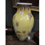 An early 20th century yellow ground Satsuma vase signed Kinkozan