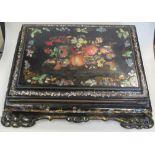 A mid Victorian black lacquer and mother of pearl decorated writing slope, with floral painted