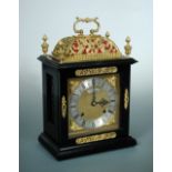 The Golden Jubilee Clock', a William and Mary style ebonised quarter striking basket top table clock