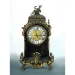 A Louis XIV ormolu mounted and brass inlaid tortoiseshell 'Boulle' bracket clock, of typical