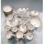A Caughley part tea and coffee service, of spirally fluted form, decorated with gilt rims,