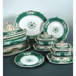 An extensive Chamberlain's Worcester dinner service, decorated with green ground borders and