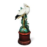 A 19th century majolica pottery heron stick stand, possibly Sarreguemines, the heron standing