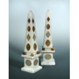 A pair of mid-19th century Italian white marble obelisks, inlaid in buff and grey stones with