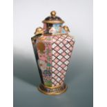 A 19th century Mason's two handled pot pourri vase and cover, circa 1815, the octagonal body with