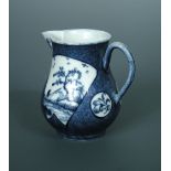 An 18th century Worcester sparrow beak cream jug, circa 1770, the powder blue ground body reserved