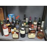 A collection of liqueurs, spirits, and other drinks (15)