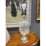 A pair of 20th century cut glass table lamps