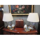 A pair of cut glass table lamps with cream shades and a pair of gilt sconces (4)