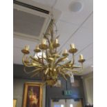 An gilt painted chandelier with wheat sheaf decoration