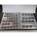 A large quantity of coins from around the world and of different dates