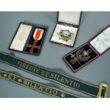 Two Masonic garters with gilt thread lettering, a silver Scottish Rite eagle and sword badge, a