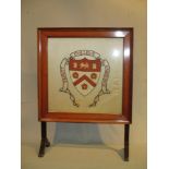 A Trinity College Cambridge embroidered silk panel, framed as a firescreen 79 x 58cm (31 x 23in)