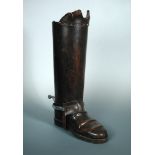 A Postillion boot stick stand, leather covered, over large size with metal liner, 55cm (21.5in) high