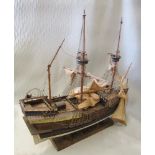 A scale wooden model of a 16th century British Galleon, 55cm (21.5in) long overall