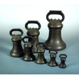 A set of seven early Victorian brass alloy Imperial Avoirdupois bell weights, for the County of