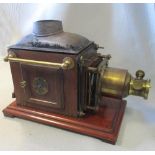 A magic lantern projector, boxed with heavy carrying handles, with lacquered brass mounts and