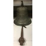 A bronze bell, the top collar dated 1824, with clapper, the mount with 20th century repairs, the