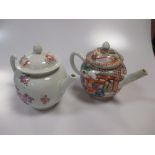 An 18th century Chinese famille rose tea pot and another in Mandarin palette