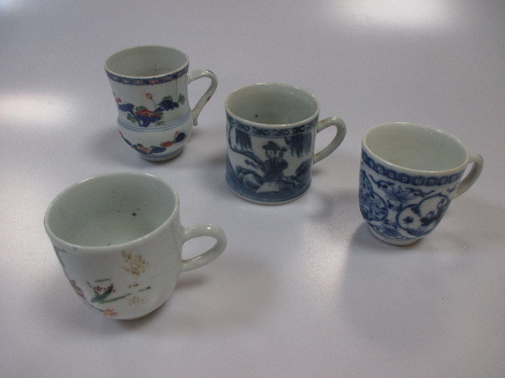 An 18th century Chinese blue and white coffee can, two coffee cups and a famille verte mug (4)