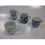 An 18th century Chinese blue and white coffee can, two coffee cups and a famille verte mug (4)