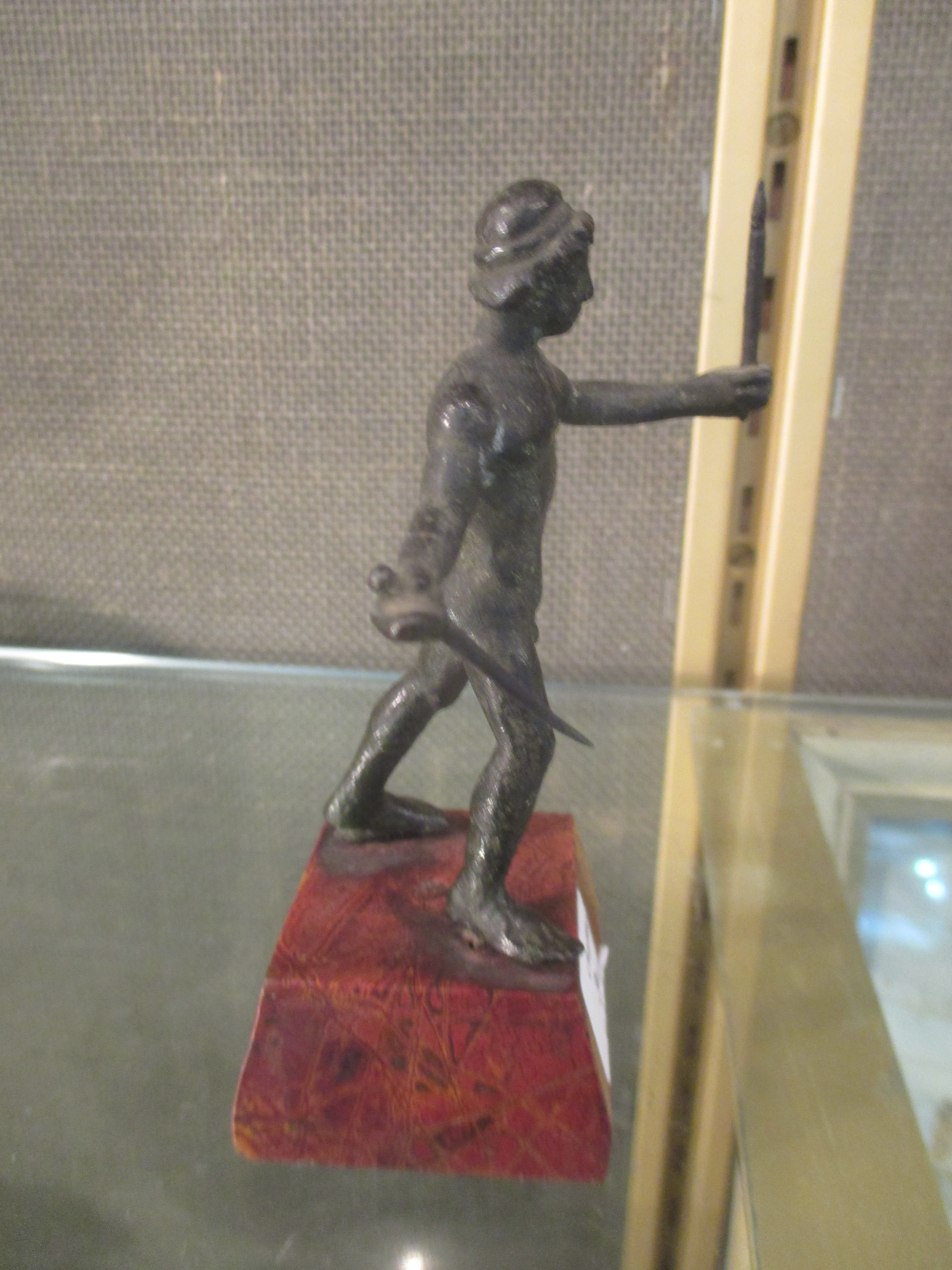 A small bronze after the Antique of a standing man holding swords - Image 5 of 6