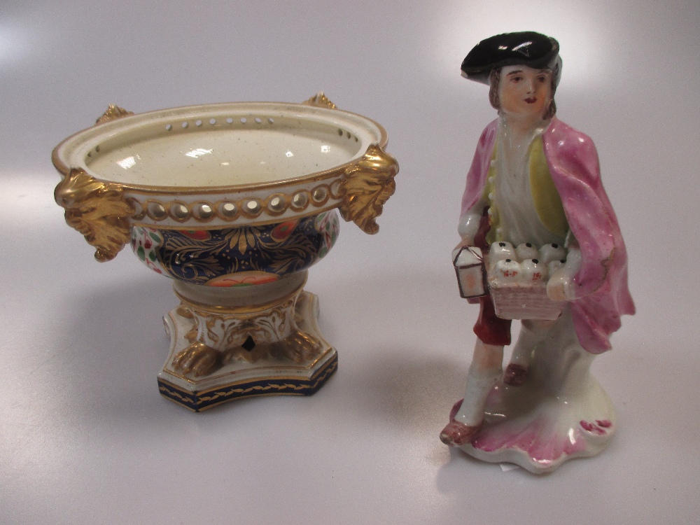 A Derby figure of a street pedlar and a pot pourri (2)