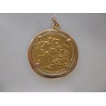 A 1906 full sovereign set in an unmarked plain yellow metal pendant mount, gross weight 10g