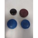 A collection of four 'sample' pill boxes, 3 of bakelite