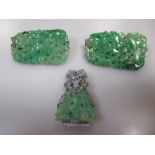 Two jade and rose cut diamond pendants with subsequant brooch conversions and a simulated jade and