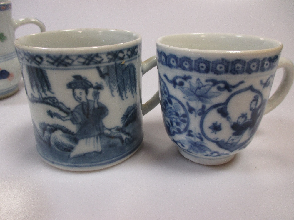An 18th century Chinese blue and white coffee can, two coffee cups and a famille verte mug (4) - Image 2 of 4