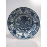 An 18th century Chinese 'Kraak' blue and white plate (restored) 28cm wide