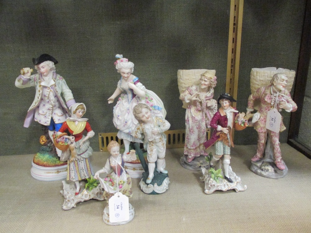 A Meissen figure of a young girl, numbered 9 and impressed 148, a pair of continental porcelain