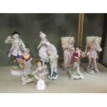 A Meissen figure of a young girl, numbered 9 and impressed 148, a pair of continental porcelain